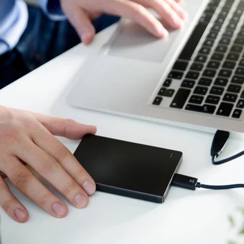 External Hard Drive plugged into a laptop