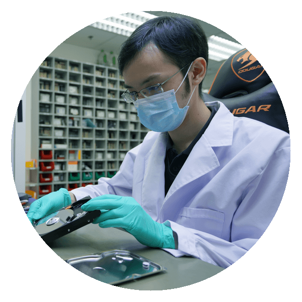 Ontrack cleanroom engineer working on an external hard drive